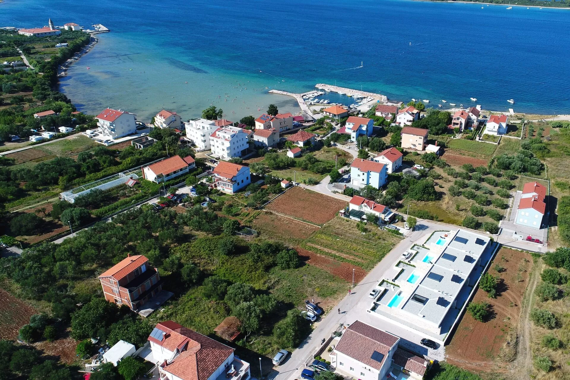 Apartmanske kuće u nizu Pašman 01 - Dva Arhitekta Zidarić
